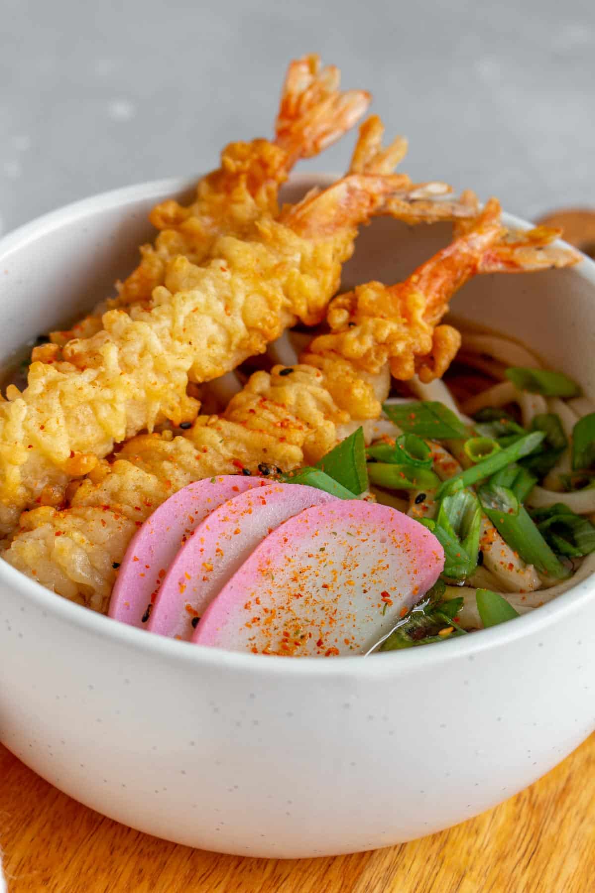 Close up of a bowl of tempura udon.
