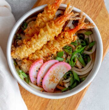 Overhead view of a bowl of tempura udon.