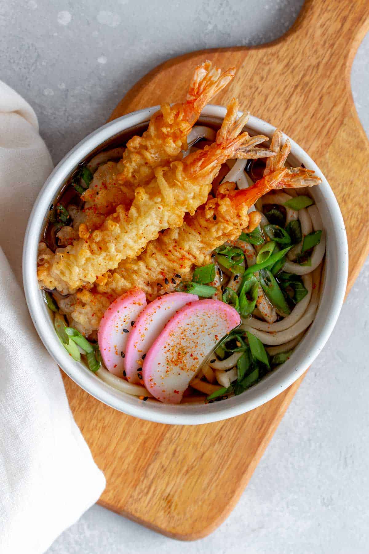 Overhead view of a bowl of tempura udon.