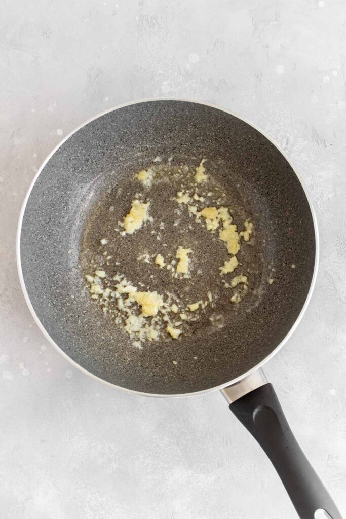 Butter and garlic in a pan.
