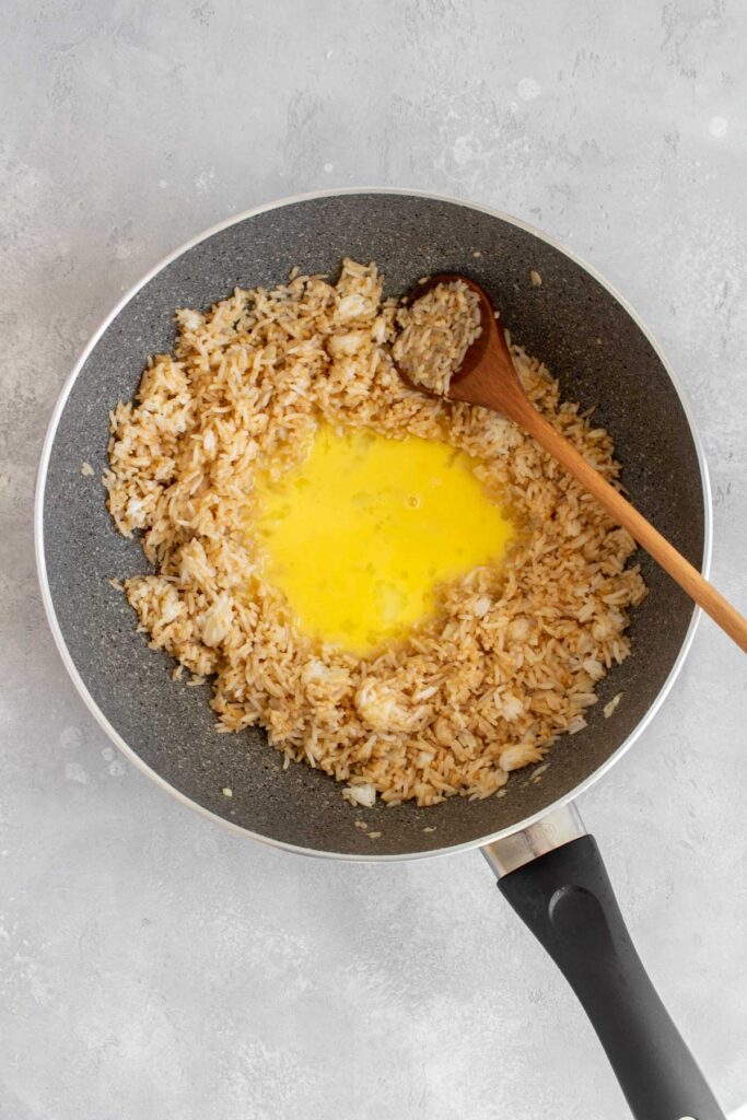 Eggs added to fried rice.