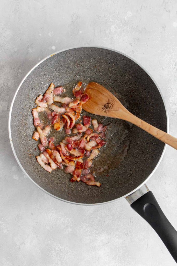 Bacon cooked in a pan.