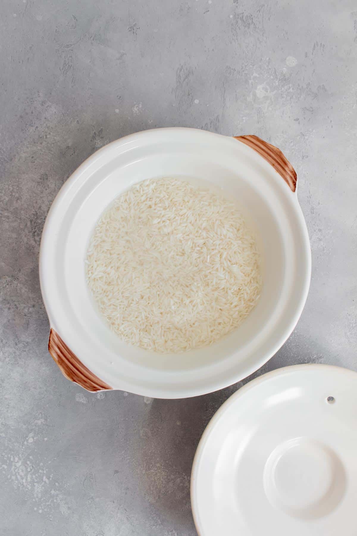 Rice soaking in a pot.