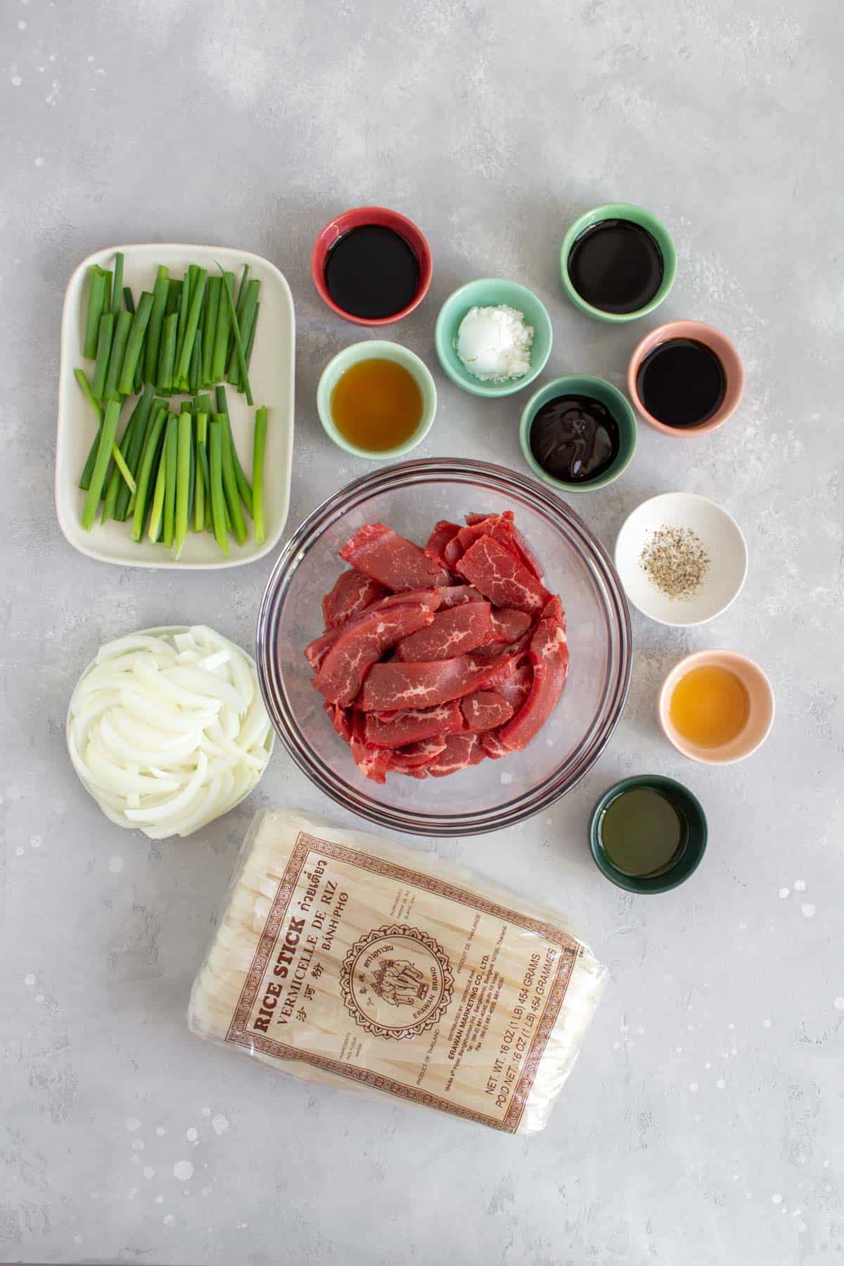 Ingredients needed to make beef chow fun.