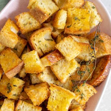 Overhead view of a platter of sourdough croutons.
