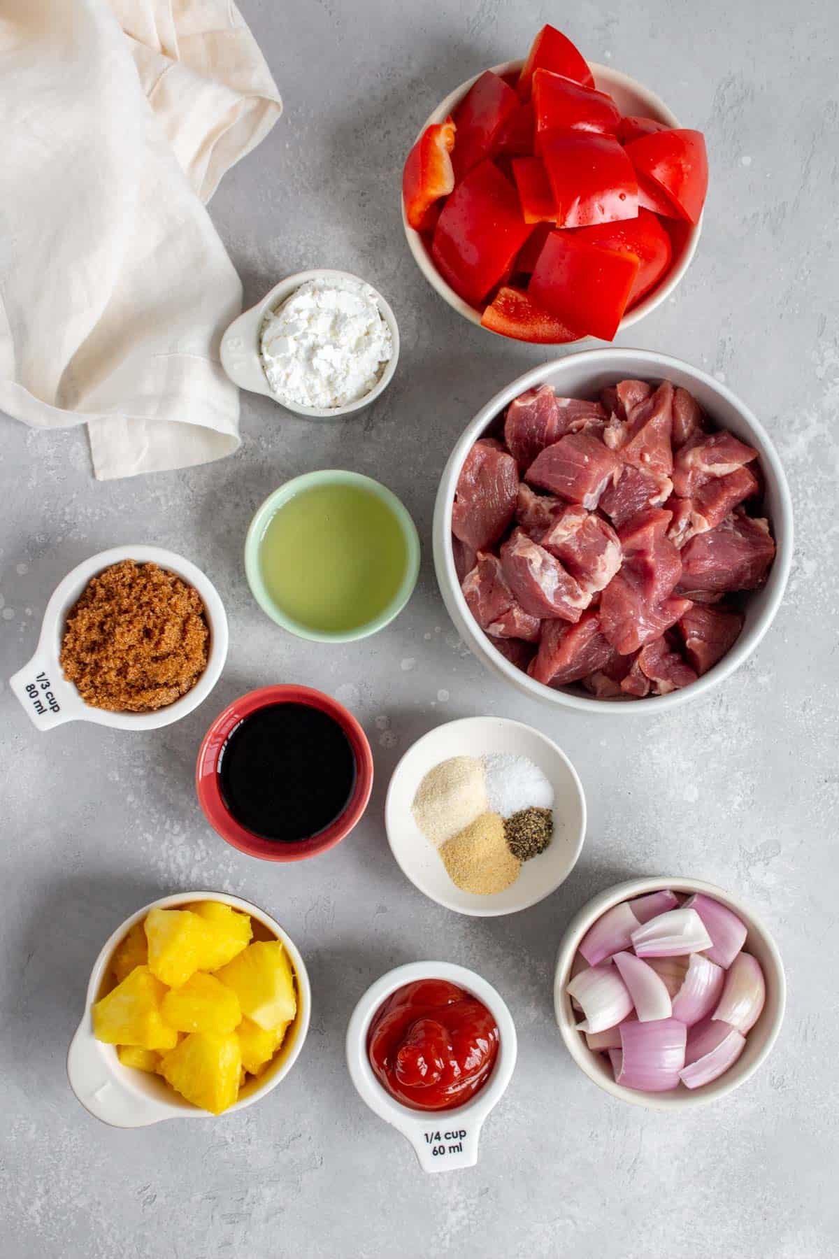 Ingredients needed to make sweet and sour pork.
