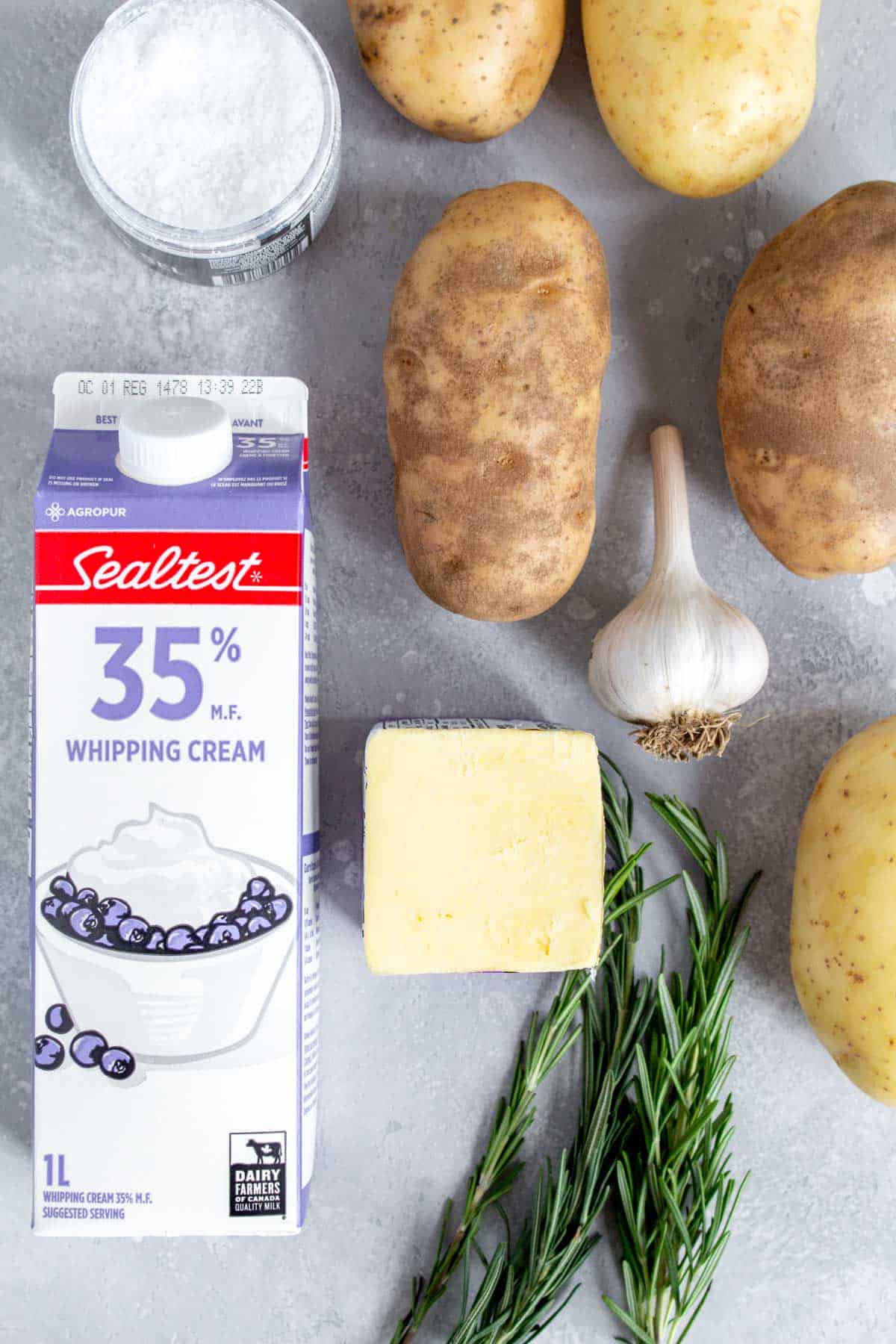 Ingredients needed to make rosemary mashed potatoes.