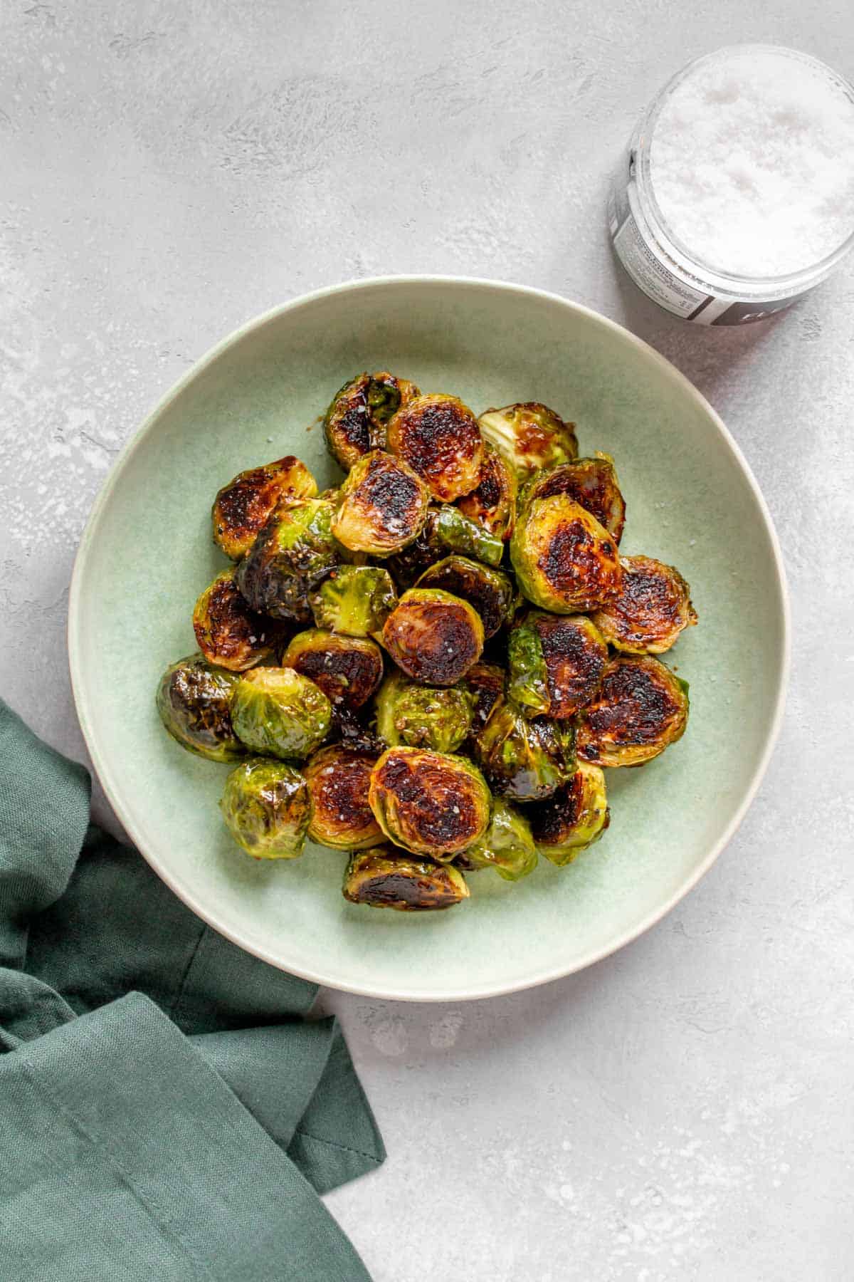 Overhead view of a plate of maple balsamic brussels sprouts.