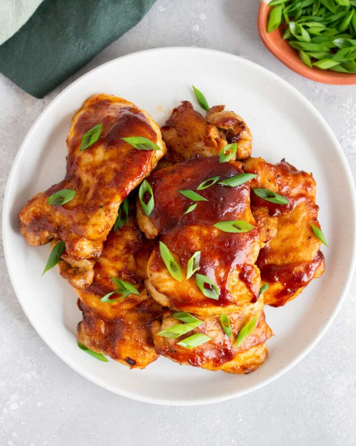 Overhead view of a plate of air fryer bbq chicken.