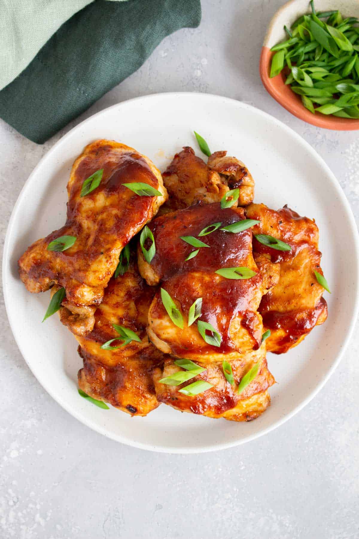 Overhead view of a plate of air fryer bbq chicken.