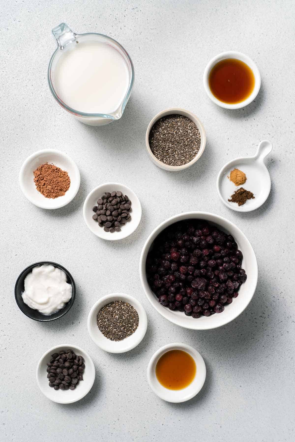 Ingredients needed to make chocolate blueberry chia pudding.