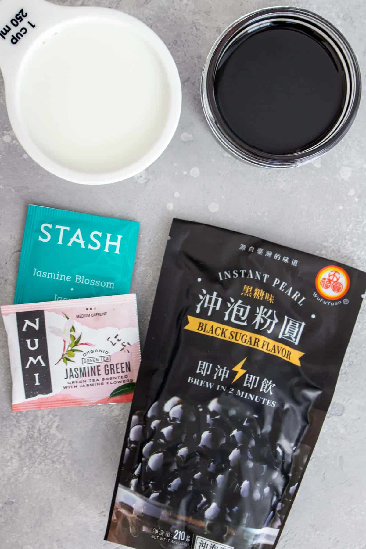 Ingredients needed to make jasmine milk tea.