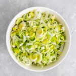 A bowl of cut leeks.