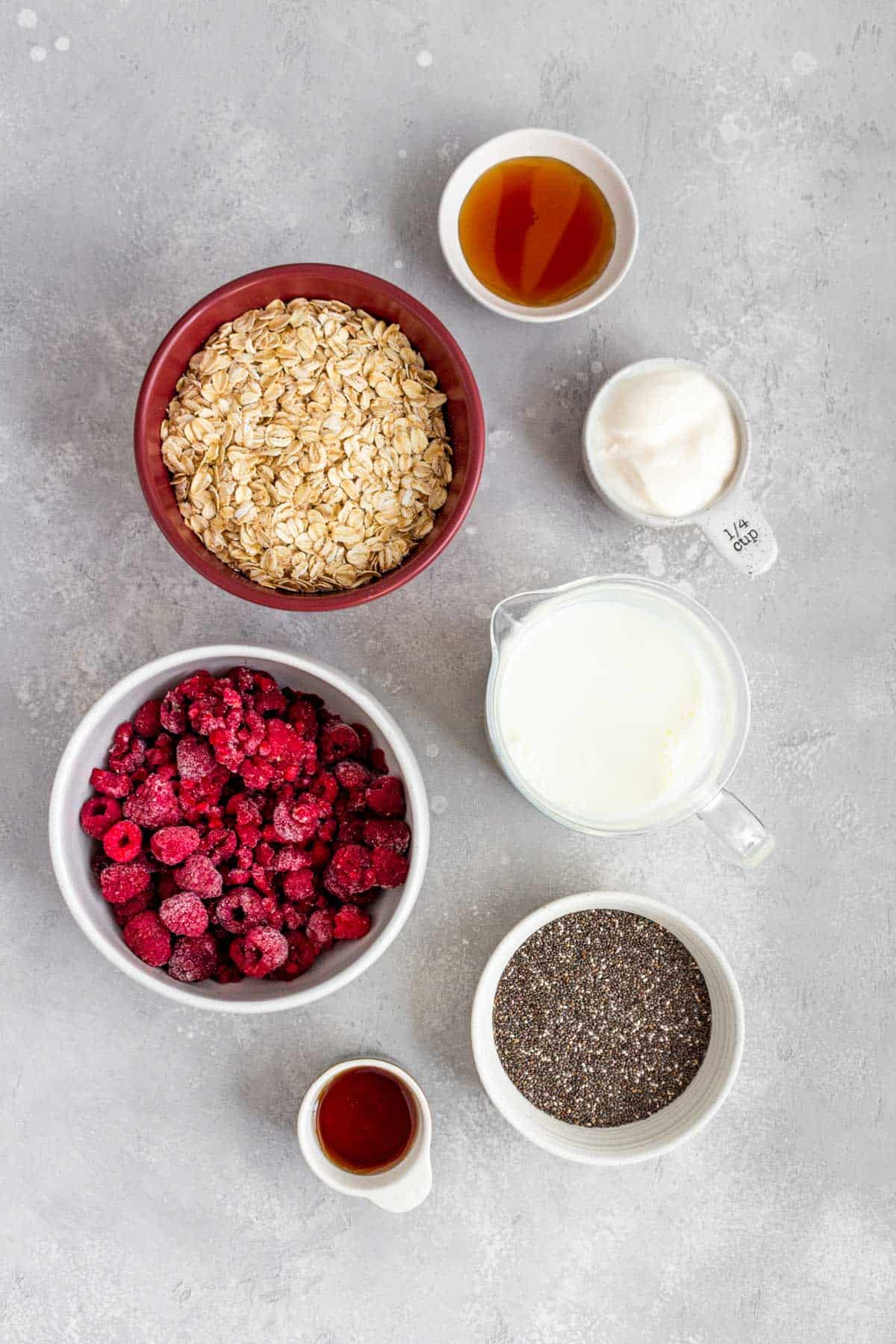 Ingredients needed to make raspberry overnight oats.