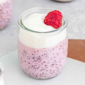 A cup of raspberry chia pudding.