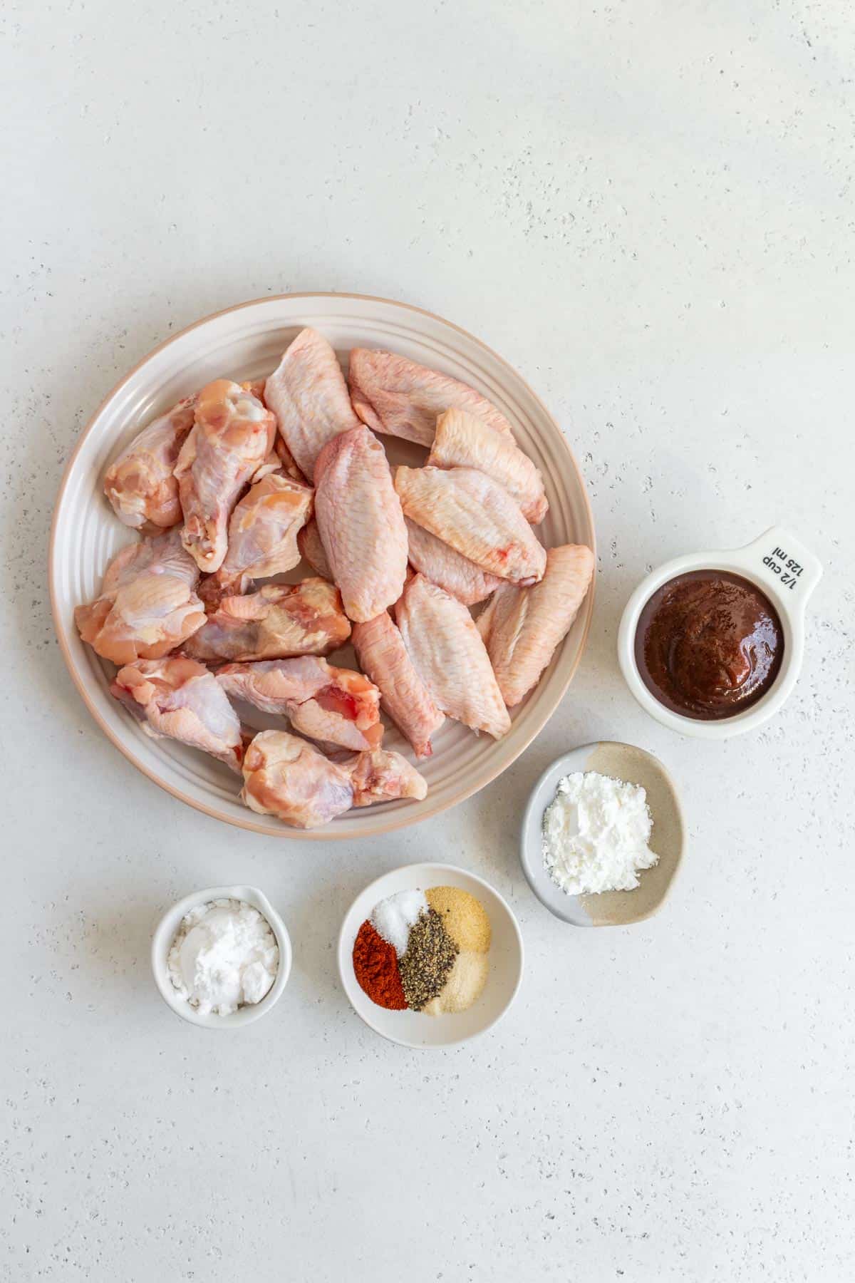 Ingredients needed to make crispy bbq chicken wings.