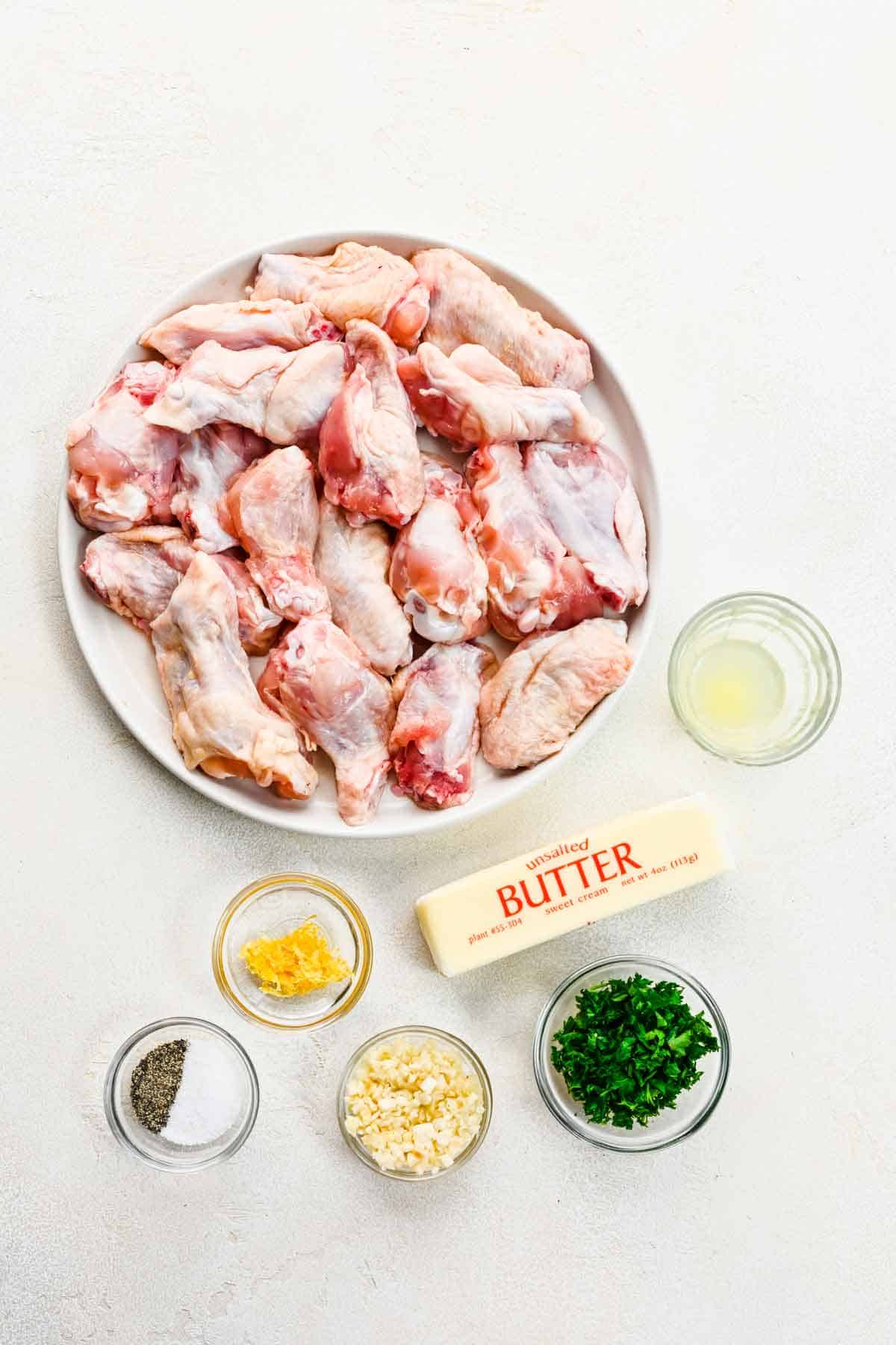 Ingredients needed to make garlic butter chicken wings.