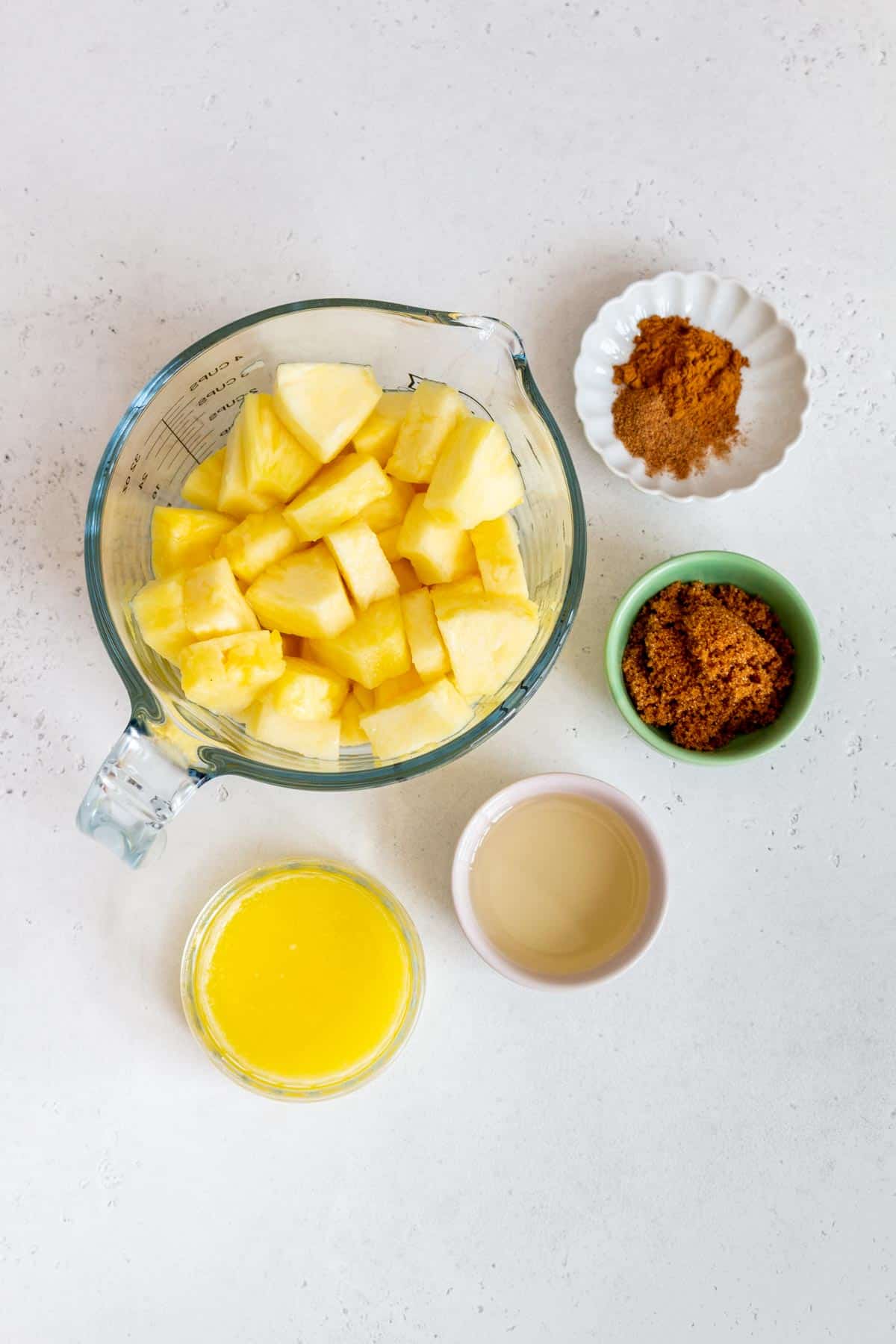 Ingredients needed to make air fryer pineapples.
