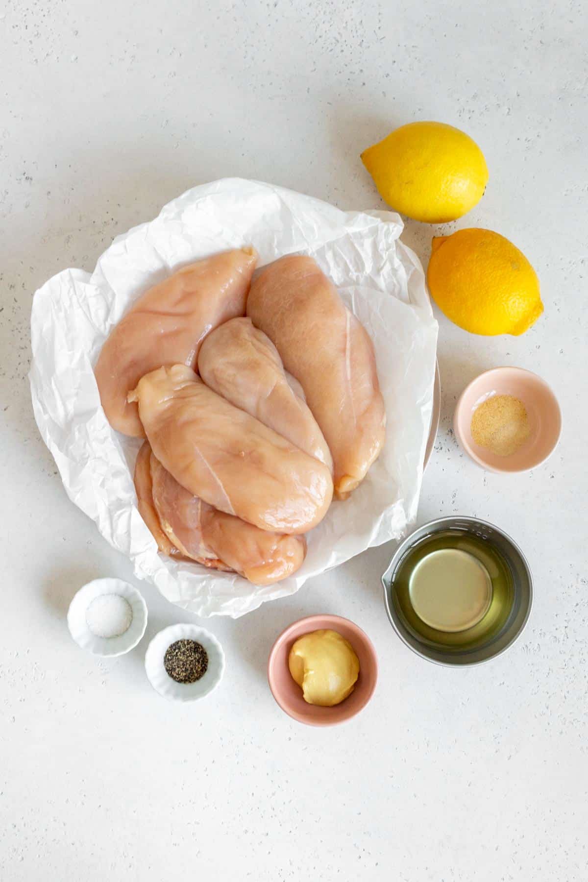 Ingredients needed for grilled lemon pepper chicken.
