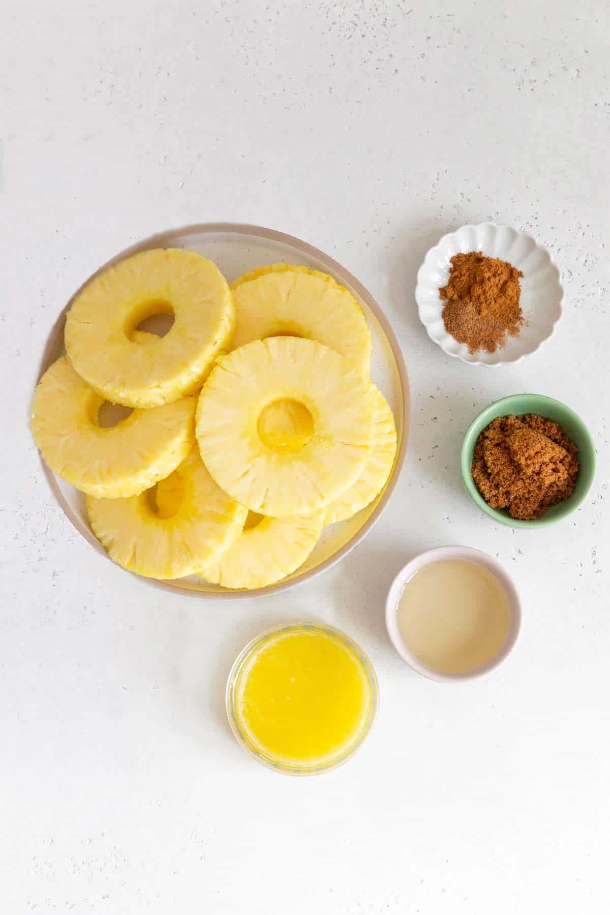 Ingredients needed to make grilled pineapples.