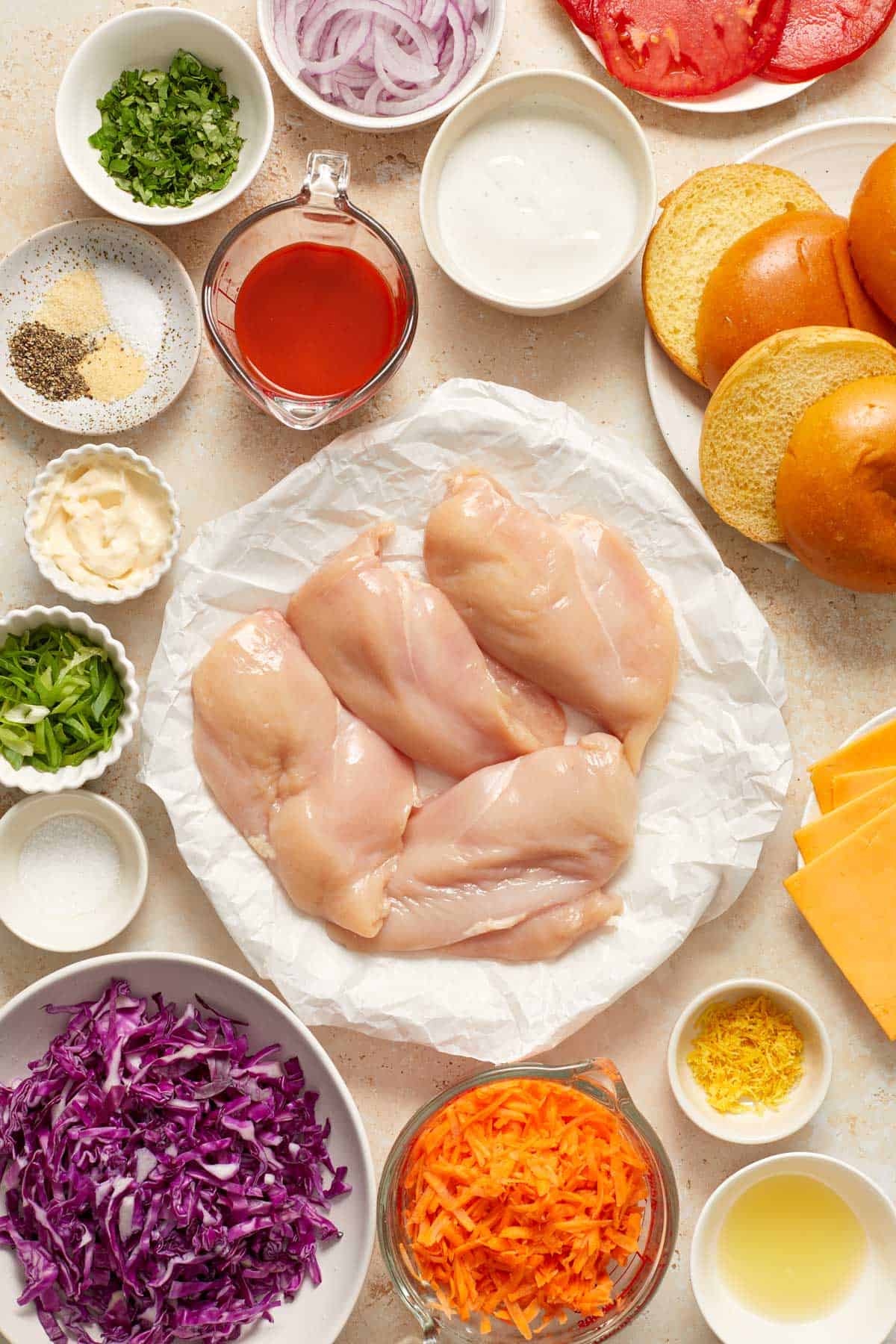 Ingredients needed to make grilled buffalo chicken sandwiches.