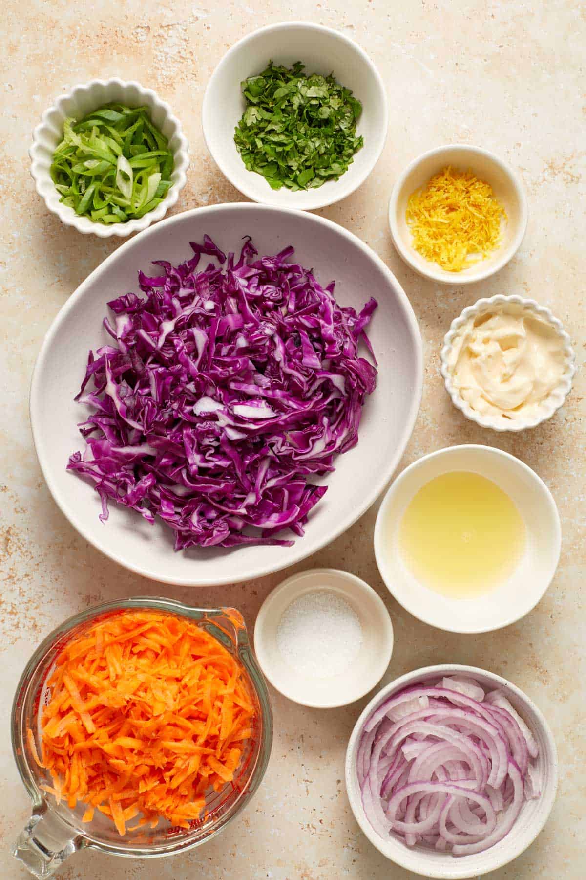 Ingredients needed to make purple cabbage slaw.