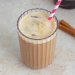 A glass of iced apple crisp oat milk shaken espresso.