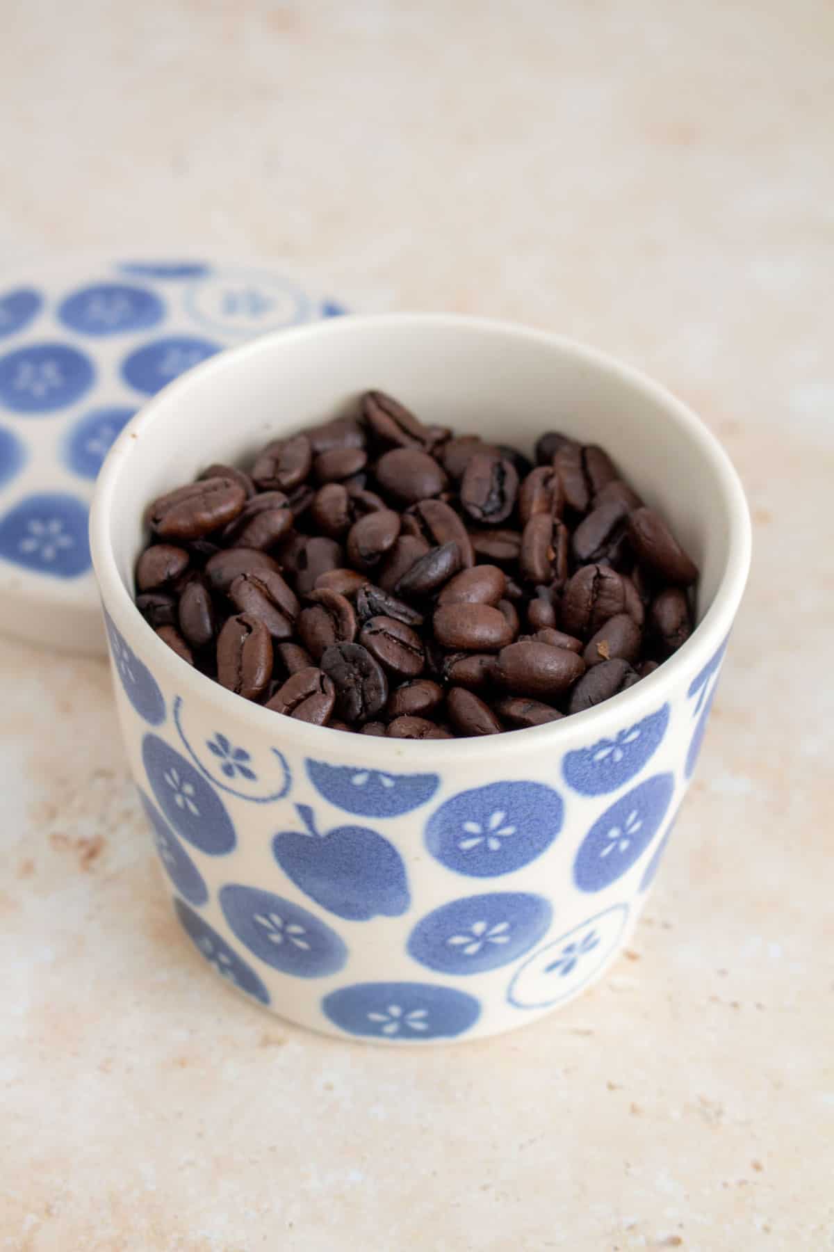 A container of coffee beans.