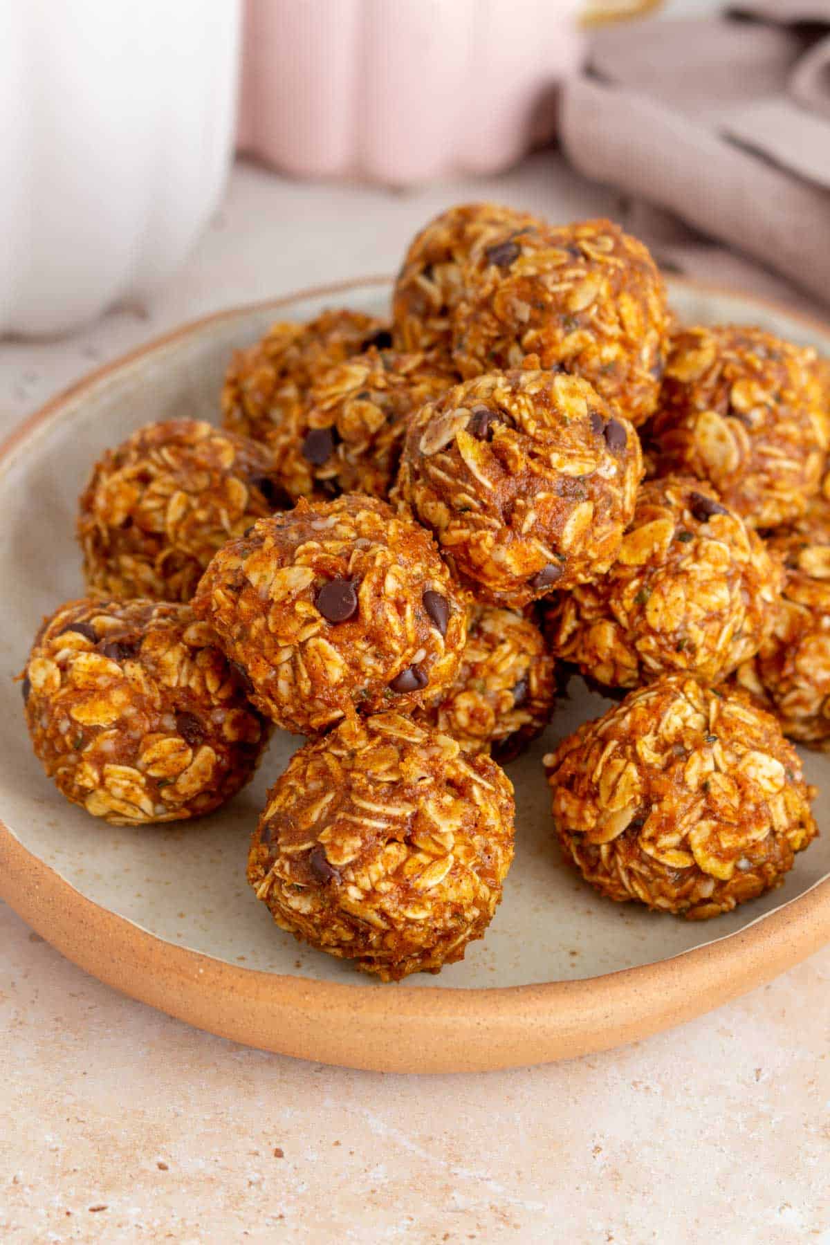 A plate with a pile of pumpkin protein balls.