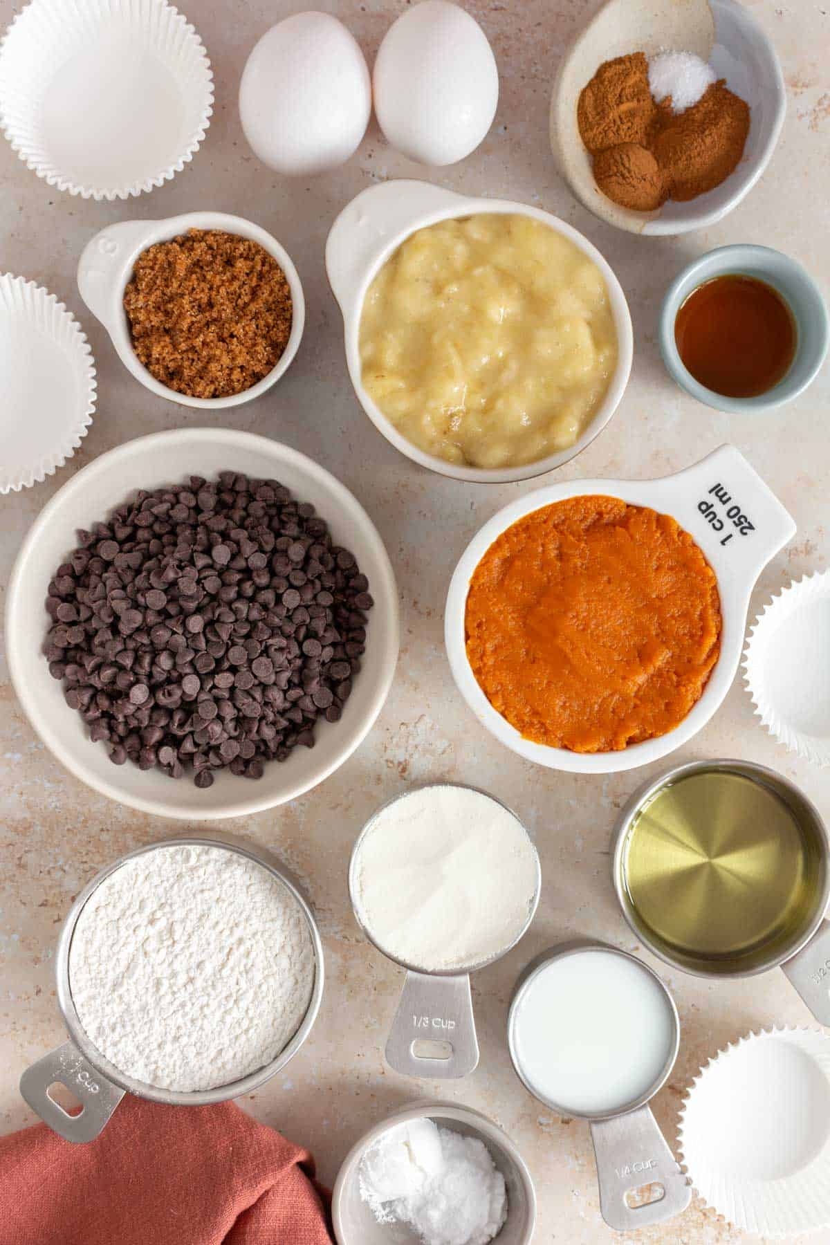 Ingredients needed to make pumpkin protein muffins.