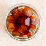 Overhead view of coffee ice cubes.