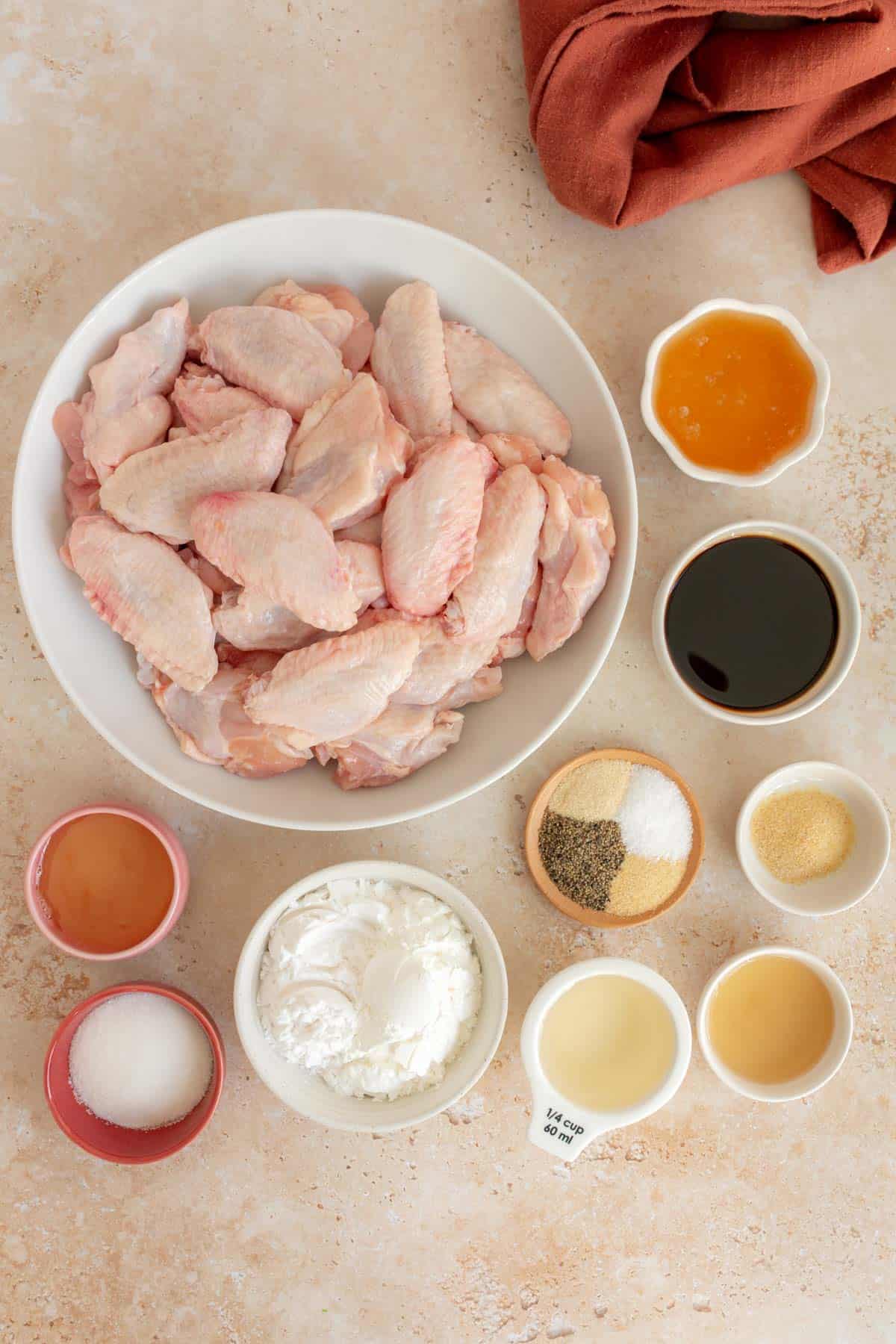 Overhead view of ingredients needed to make honey soy chicken wings.
