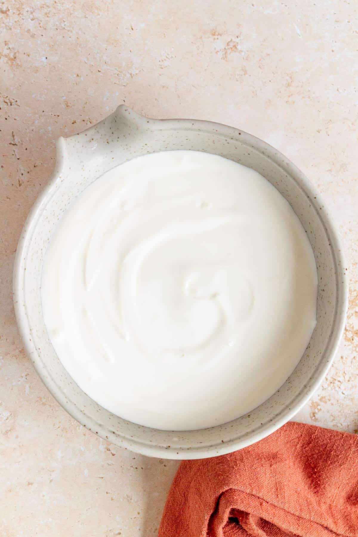 A bowl of whipped cottage cheese.