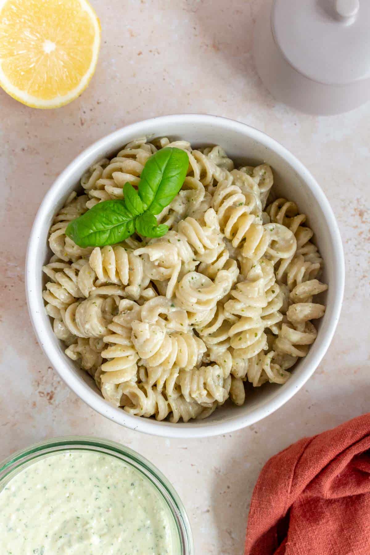 A bowl of pasta coated in cottage cheese pesto.