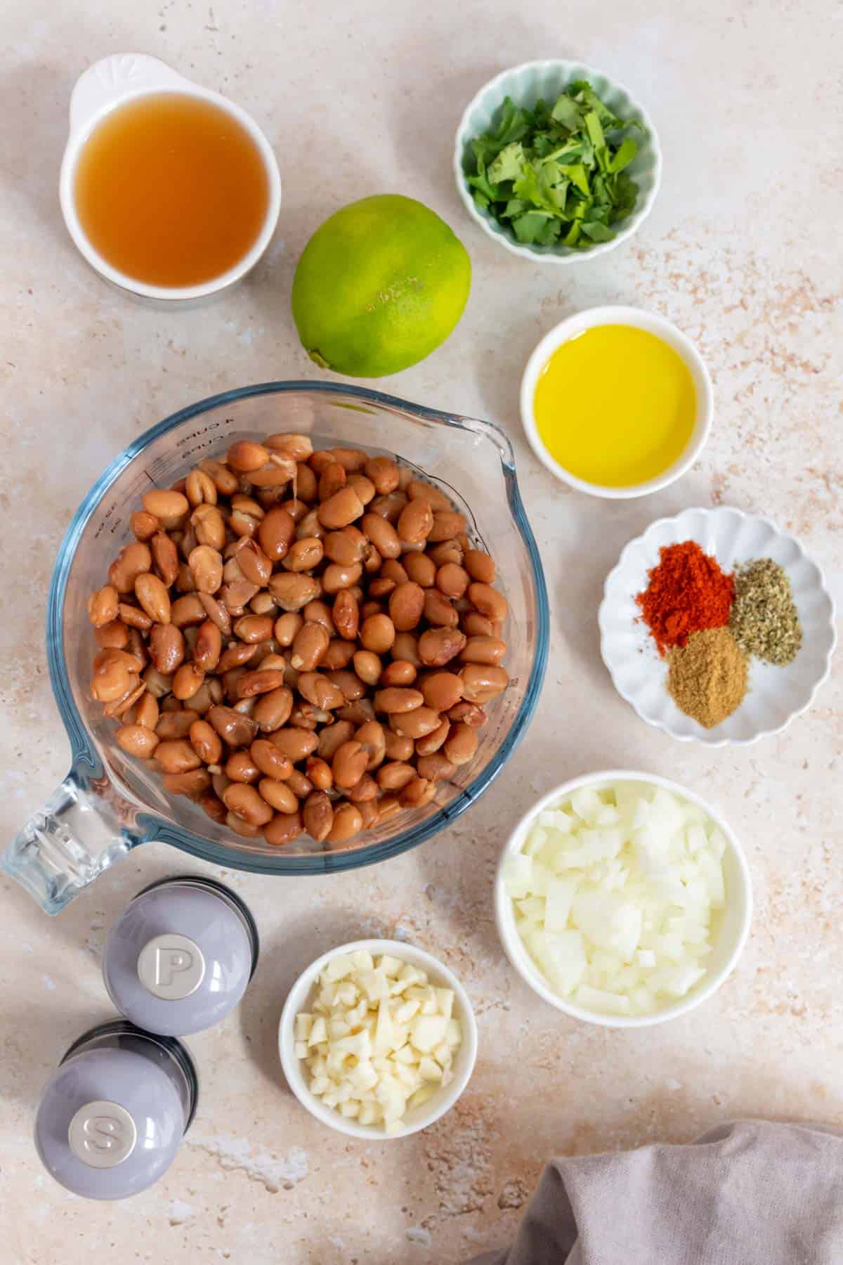 Ingredients needed to make refried beans.