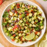 Overhead view of a plate of pineapple pico de gallo.