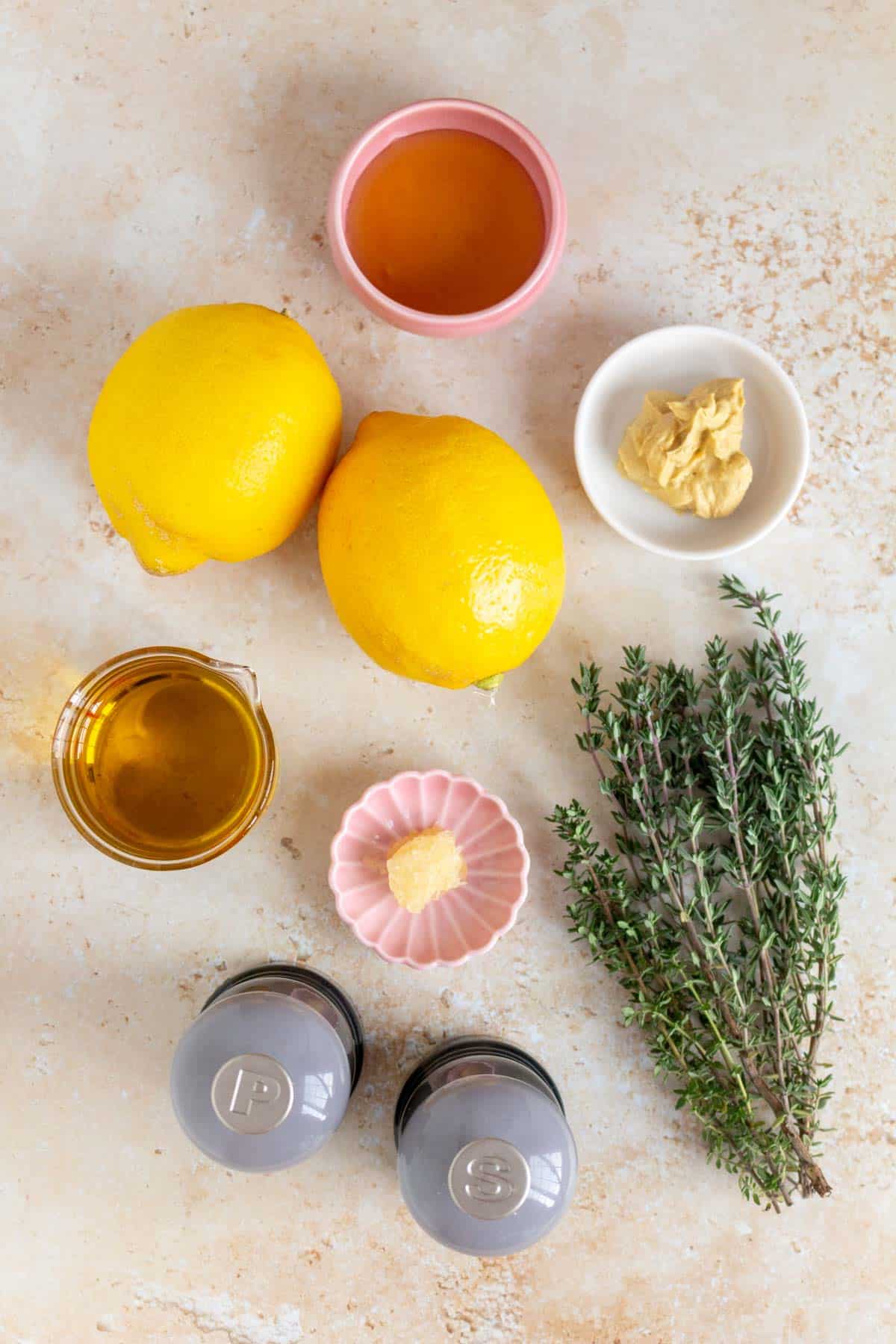 Ingredients needed to make lemon thyme vinaigrette.