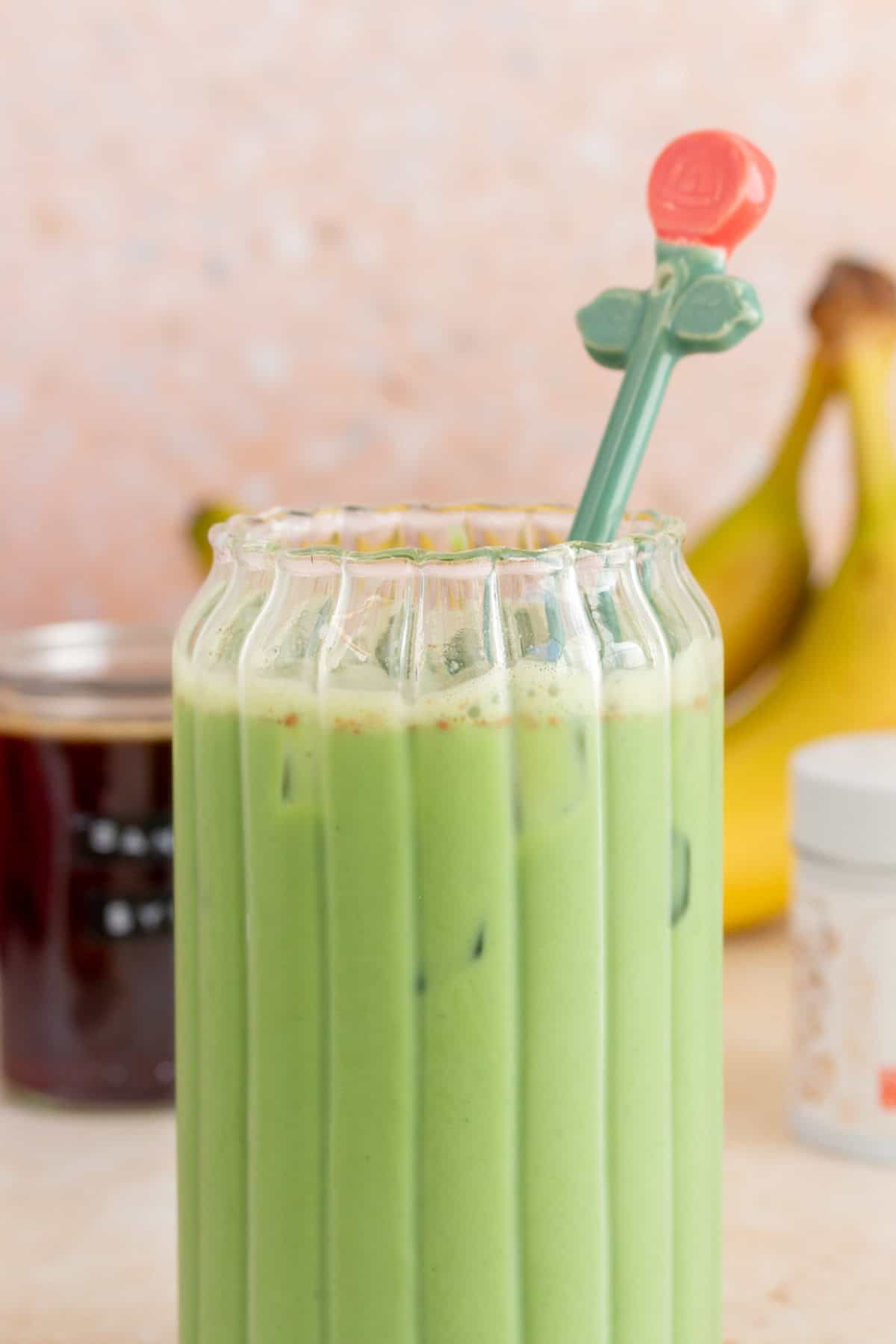 A close up view of a glass of banana bread matcha.