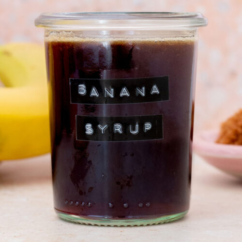 A jar of homemade fresh banana simple syrup.