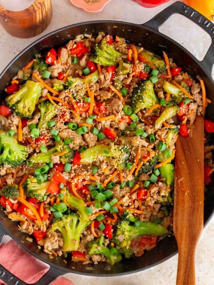 Overhead view of a skillet of ground turkey teriyaki.
