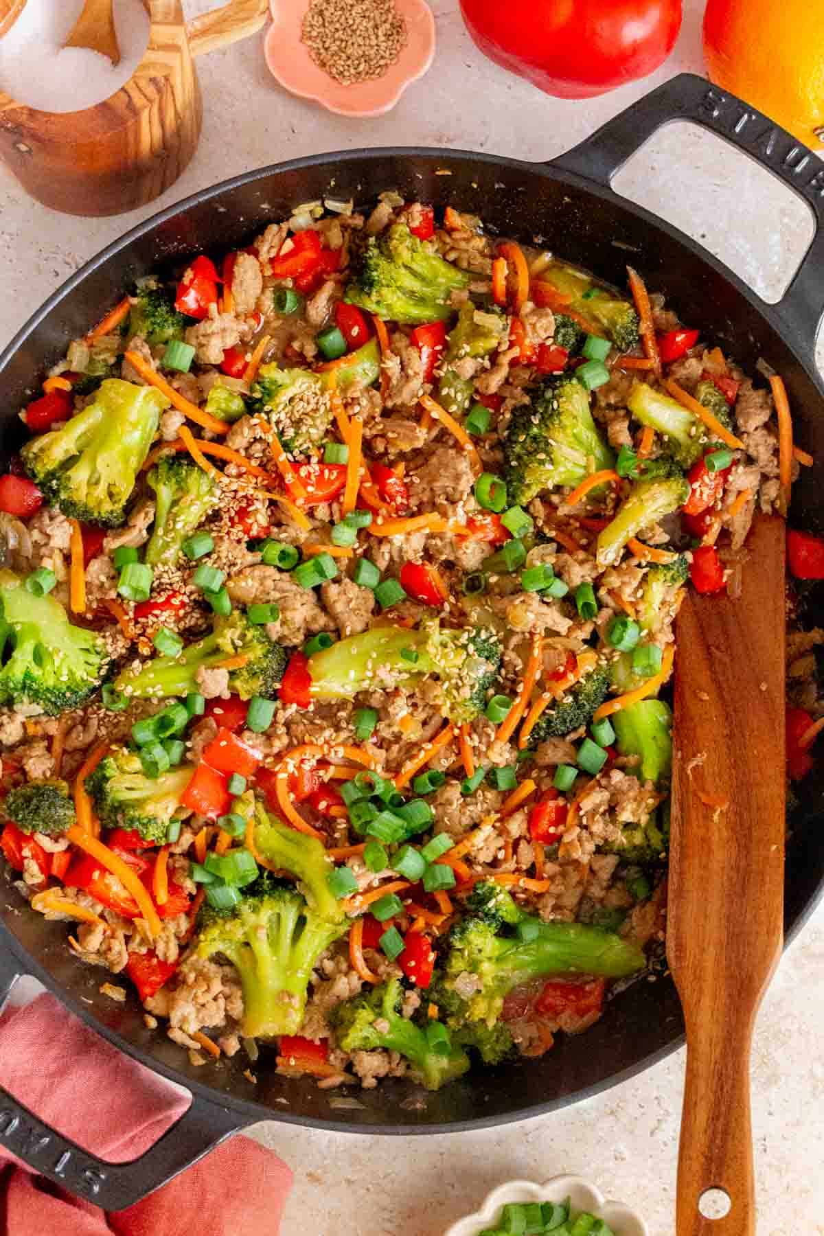 Overhead view of a skillet of ground turkey teriyaki.