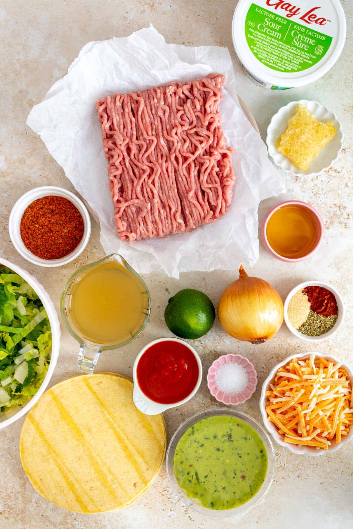 Ingredients needed to make ground turkey tacos.