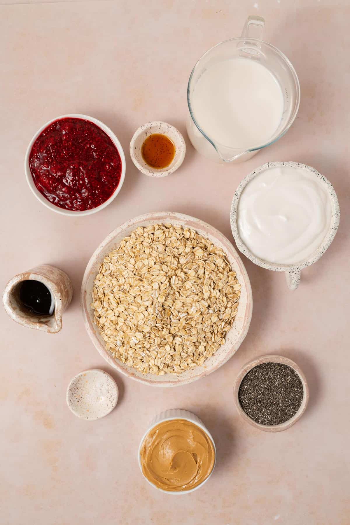 Ingredients needed to make peanut butter and jelly overnight oats.