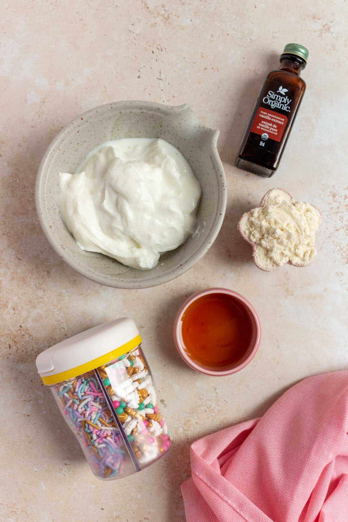 Ingredients needed to make funfetti greek yogurt dip.