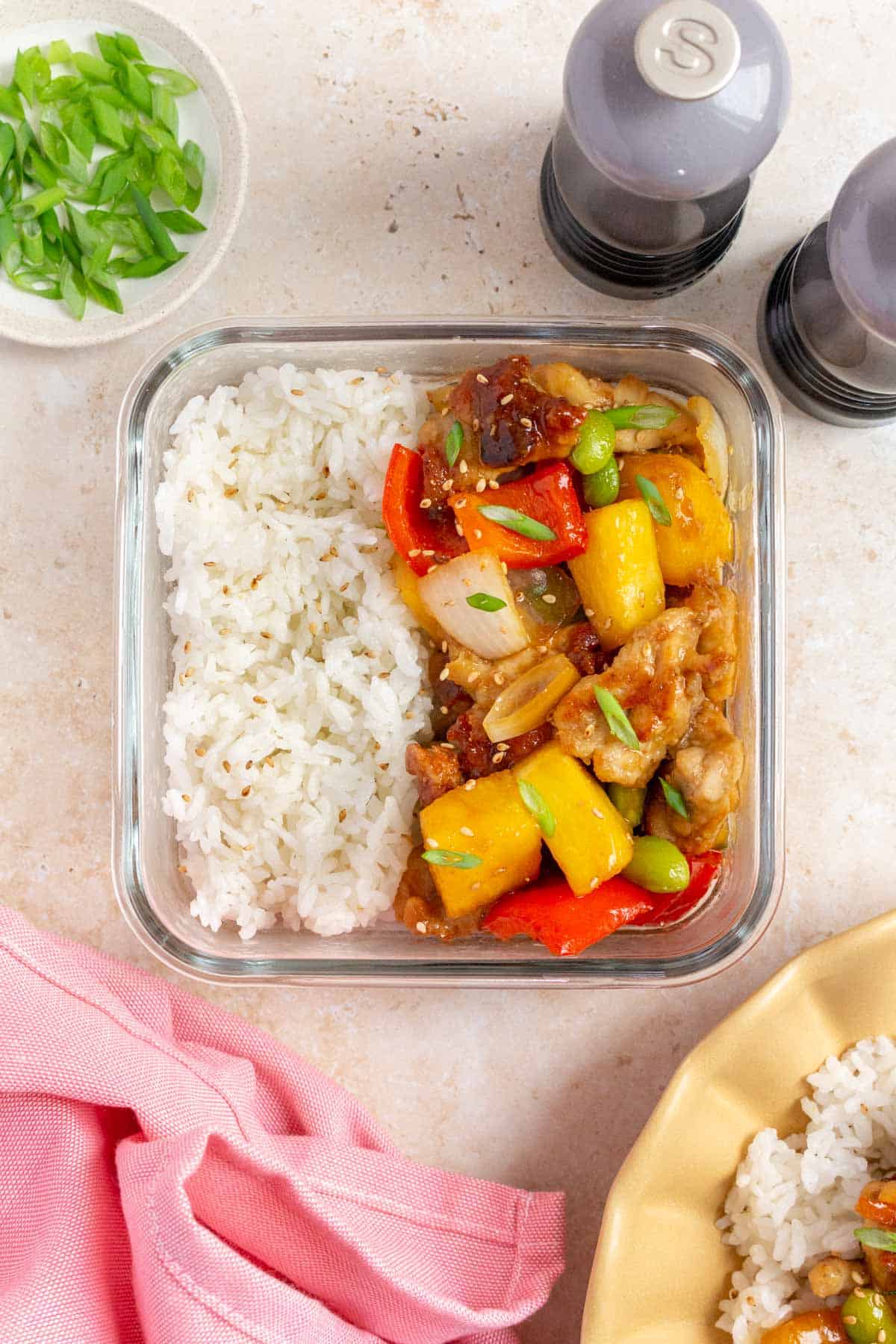 A meal prep container of teriyaki pineapple chicken bowl.