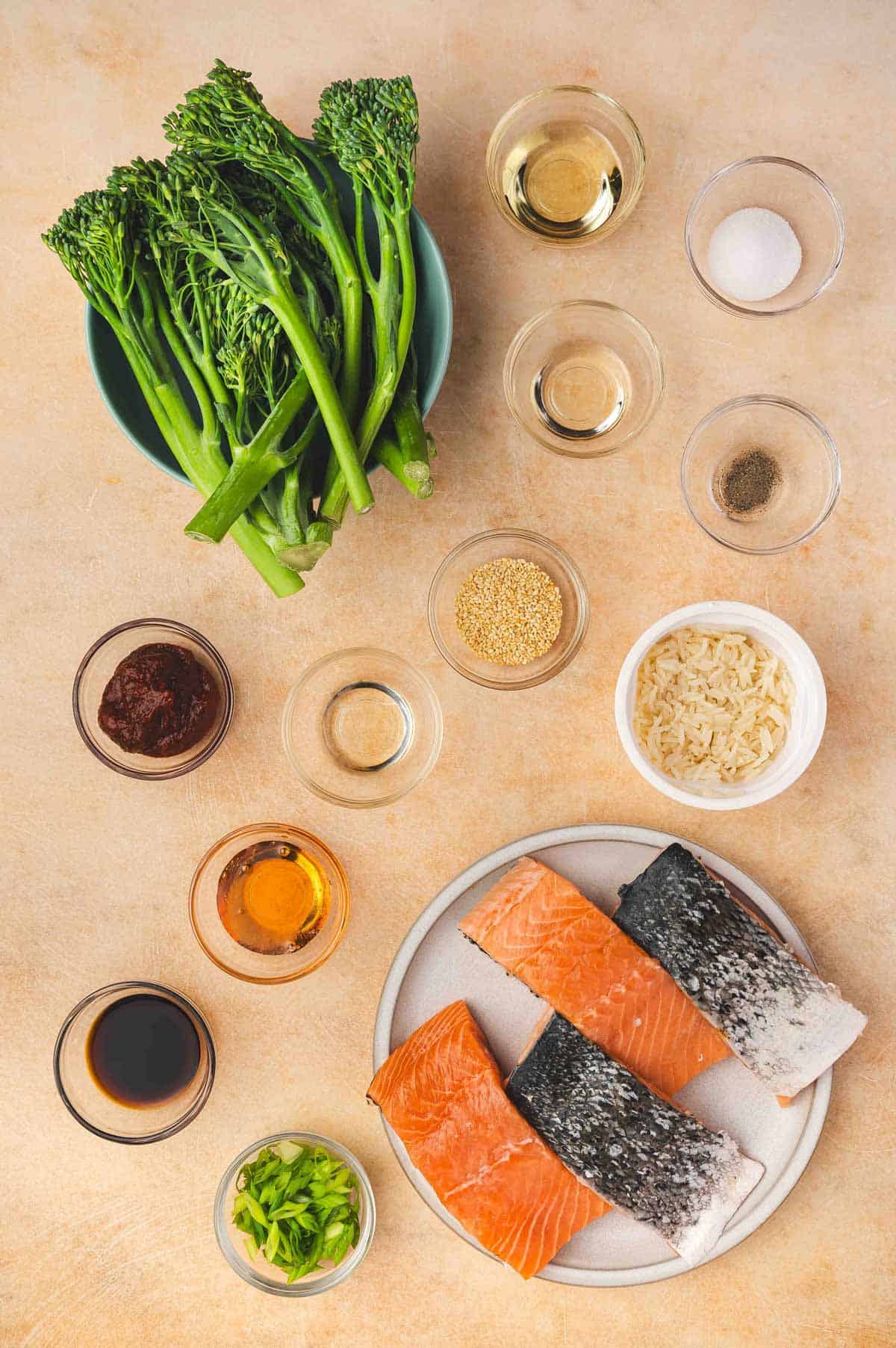 Ingredients needed to make sheet pan gochujang salmon with broccolini.