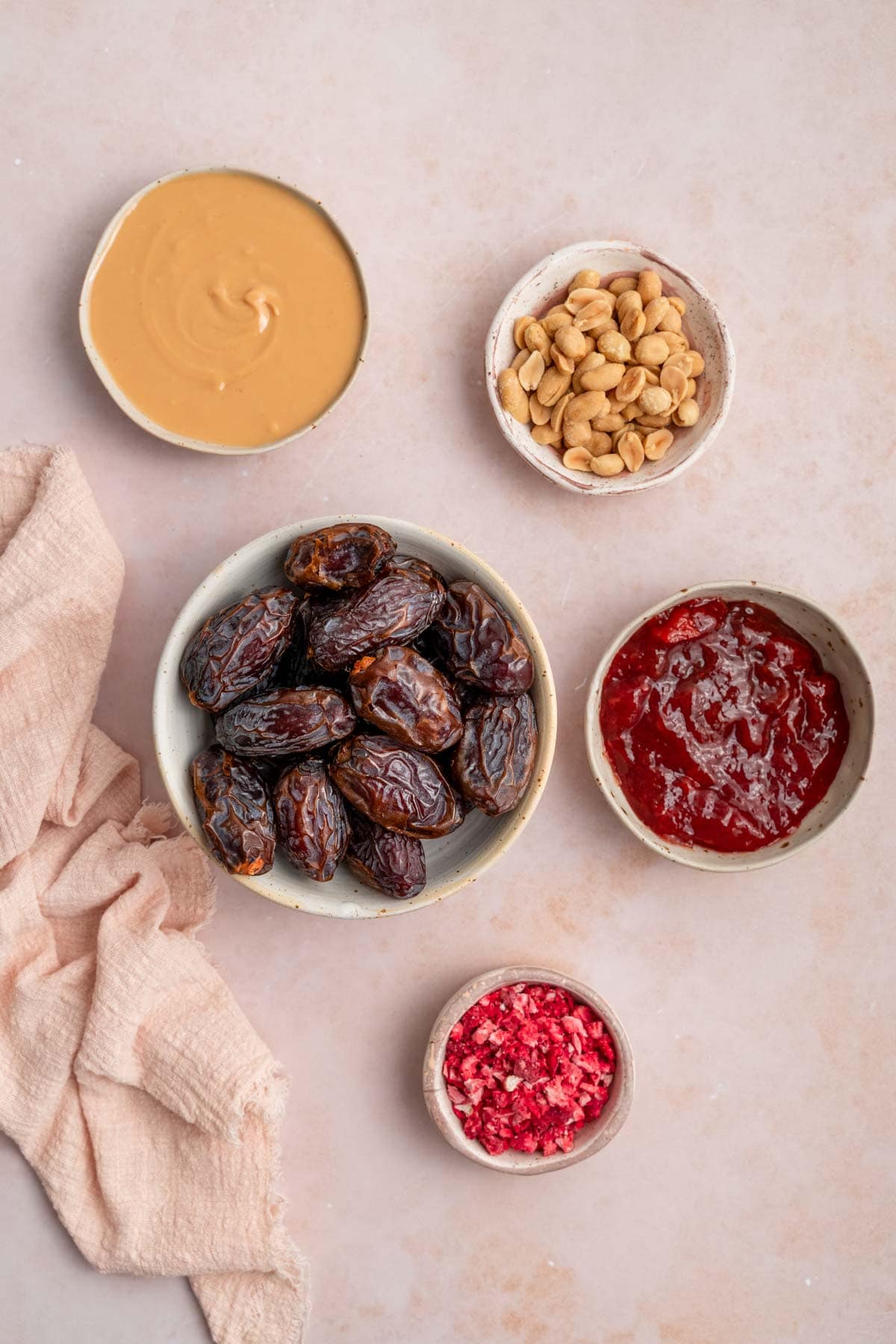 Ingredients needed to make peanut butter and jelly stuffed dates.