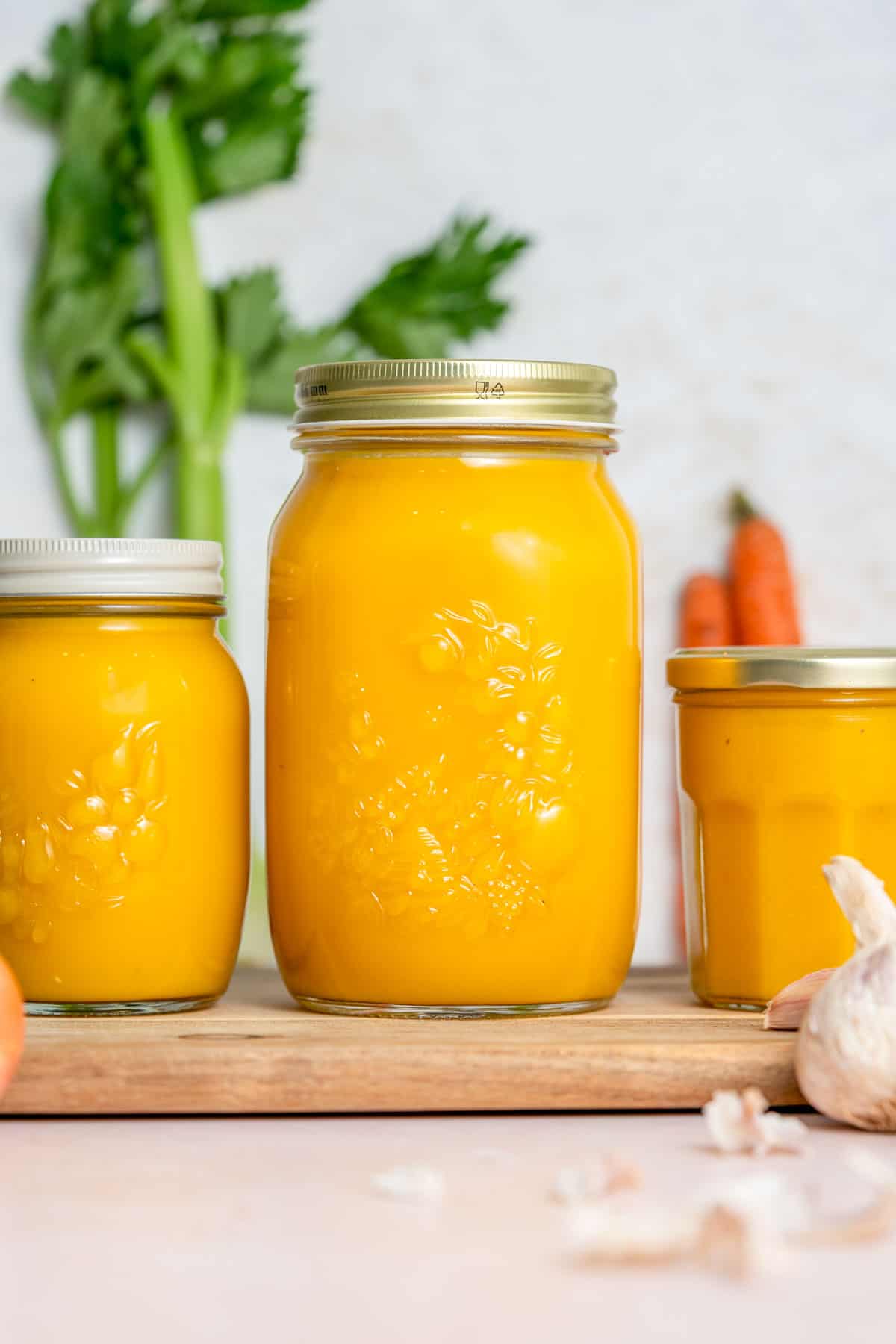 Three jars of veggie packed broth.