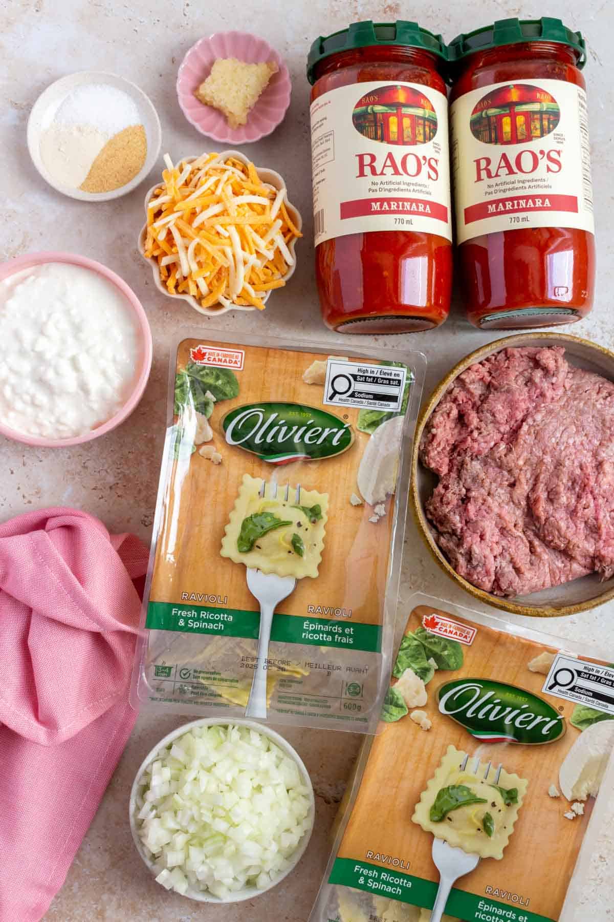 Ingredients needed to make ravioli lasagna.