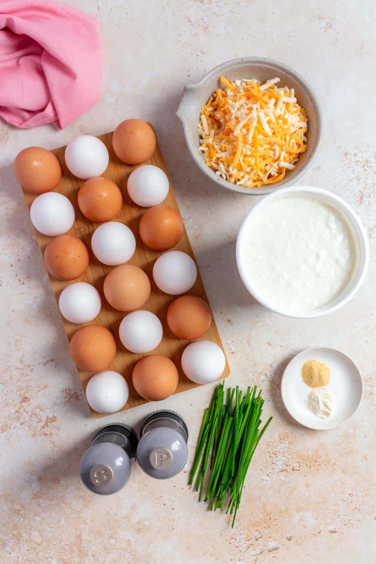 Ingredients needed to make sheet pan cottage cheese eggs.